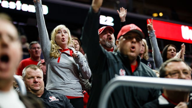 North Scott fans cheer during their teams match against Fort Dodge at the Wrestling State Team Dual tournament on Wednesday, Feb. 15, 2017 in Des Moines.