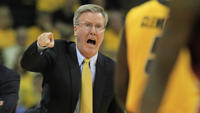 Iowa coach Fran McCaffery yells out from the sidelines of an NCAA men's college basketball game between Iowa State and the University of Iowa on Friday, Dec. 7, 2012 in Iowa City, Iowa.