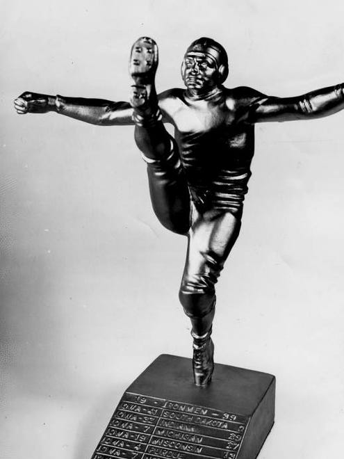 This metal stauette is of Nile Kinnick, Iowa's all-American halfback.
