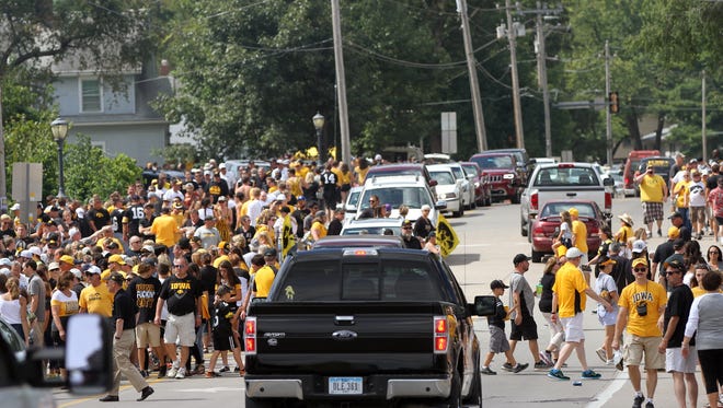 Football fans fill Melrose Avenue prior to the Hawkeyes' game against Miami (Ohio) at Kinnick Stadium on Saturday, Sept. 3, 2016.