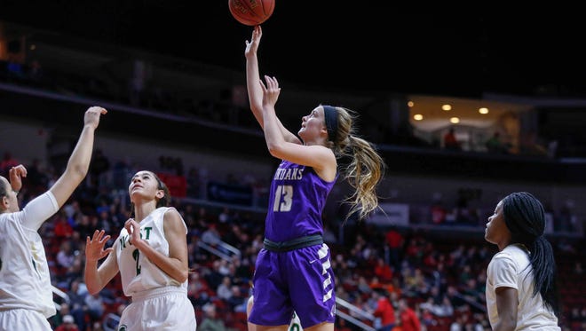 Indianola junior Maggie McGraw floats a shot into the basket against Iowa City West during the 5A semifinal game at the girls state basketball tournament on Thursday, March 1, 2018, at Wells Fargo Arena in Des Moines.