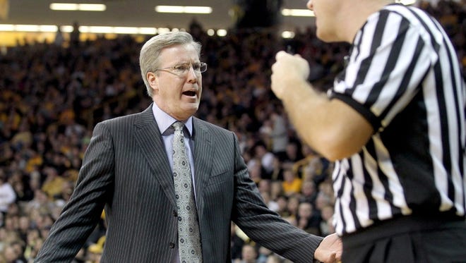 Iowa head coach Fran McCaffery gets fired up during the Hawkeyes game against Minnesota on Sunday, February 17, 2013.