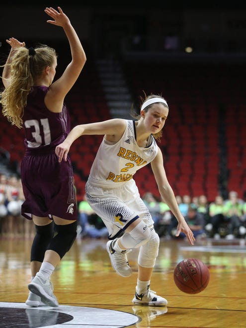 Iowa City Regina's Mary Crompton drives to the hoop during the Class 2A Girls' state basketball quarterfinal game between Iowa City Regina and Grundy Center on Tuesday, Feb. 27, 2018, in Wells Fargo Arena. Grundy Center won the game, 46-45.