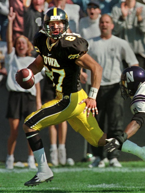 From 1998: Iowa's Kevin Kasper breaks away on a 49-yard touchdown pass from Randy Reiners against Northwestern.