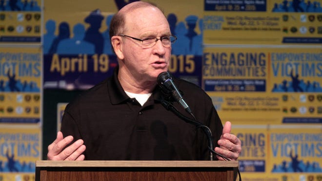 Dan Gable speaks about the murder of his sister, Diane, during a National Crime Victims’ Rights Week event Wednesday.