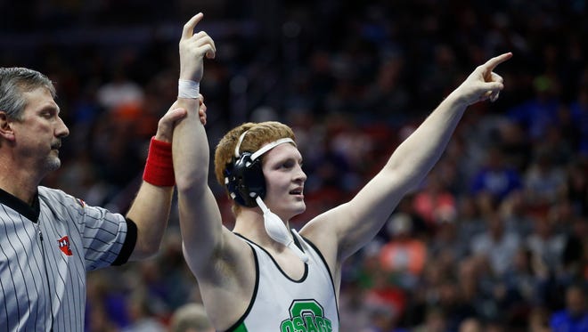 OsageÕs Brock Jennings wins the class 2A, 170-pound title match Saturday, Feb. 18, 2017 in the state wrestling finals at Wells Fargo Arena in Des Moines.