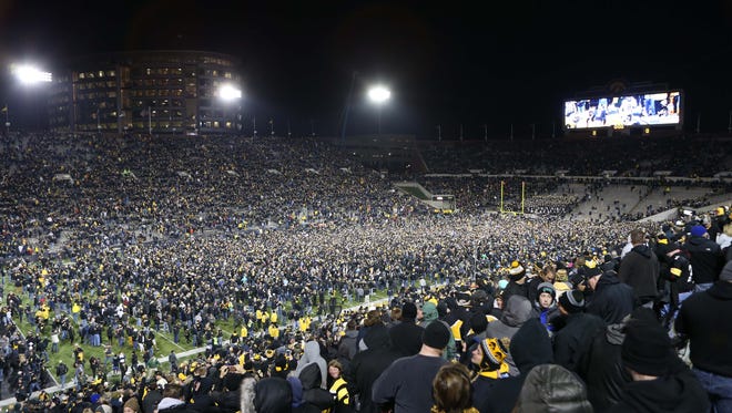 We're pretty sure you remember this night: Fans storm the field after Iowa Hawkeyes place kicker Keith Duncan kicks the game-winning field goal against the Michigan Wolverines at Kinnick Stadium last November. The Hawkeyes won 14-13 that day, and they face No. 4 Penn State under the Kinnick lights this Saturday.