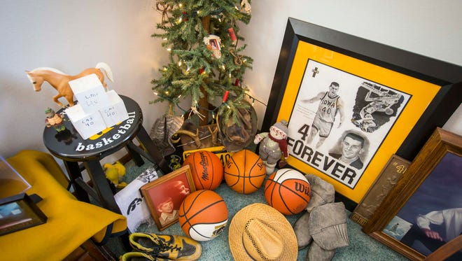 Mike and Patty Street keep items to remember their son Chris Street in his old bed room of their Indianola home.