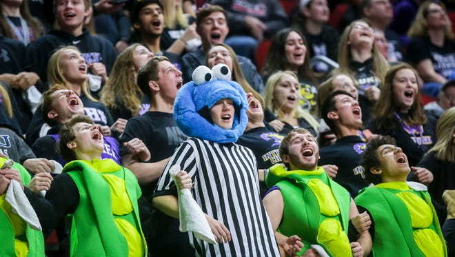 Waukee fans cheer against Johnsston during their first round 5A matchup in the girls' state basketball tournament Monday, Feb. 26, 2018, at Wells Fargo Arena in Des Moines, Iowa.