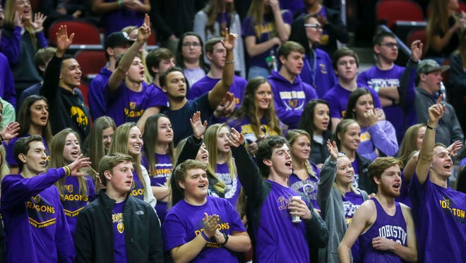 Johnston's fans cheer against Waukee during their first round 5A matchup in the girls' state basketball tournament Monday, Feb. 26, 2018, at Wells Fargo Arena in Des Moines, Iowa. Johnston defeated Waukee 73-48.