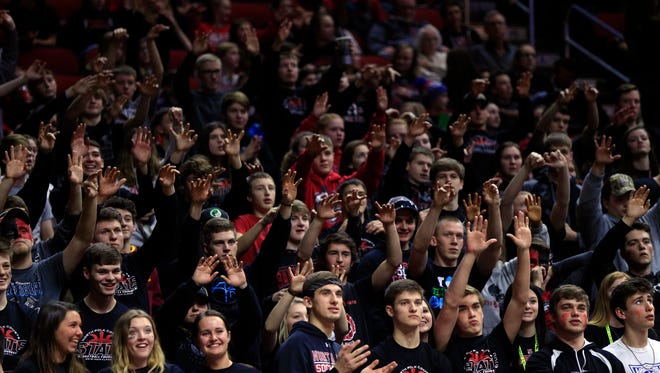 North Polk fans cheer during the Class 3A-2 first round game against Davenport Assumption Tuesday, Feb. 27, 2018 at Wells Fargo Arena.