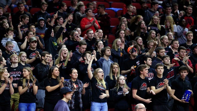 North Polk fans cheer during the 3A semifinal against Crestwood Thursday, March 1, 2018.