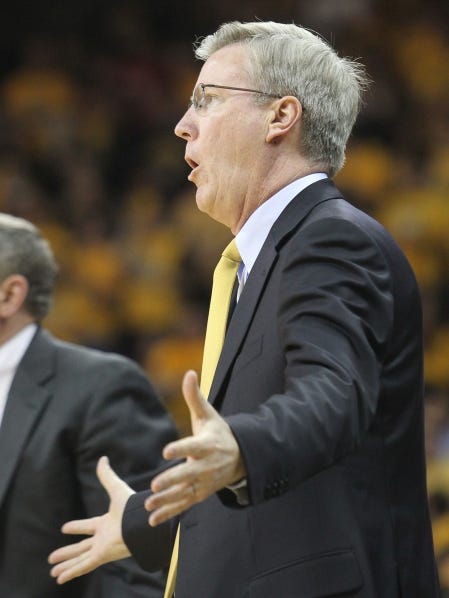 Iowa head coach Fran McCaffery talks with his team during the Hawkeyes game against in-state rival Iowa State in Iowa City on Friday, December 6, 2012.
