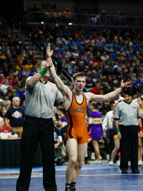 ValleyÕs Nick Oldham celebrates after defeating Caleb Rathjen of Ankeny during their class 3A 113 pound championship match at Wells Fargo Arena on Saturday, Feb. 17, 2018, in Des Moines.