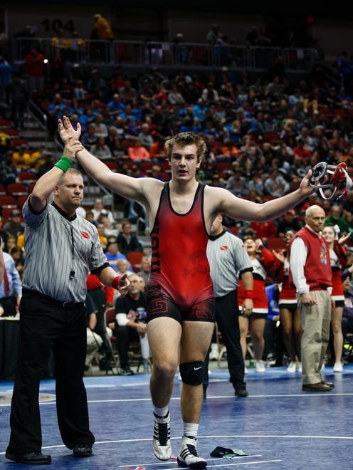 Jacob Dykes of Iowa City, City High celebrates a 7-2 win over Reece Bowlin of Indianola during their class 3A 195 pound championship match at Wells Fargo Arena on Saturday, Feb. 17, 2018, in Des Moines.