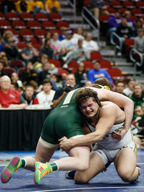 Caleb Sanders of Glenwood wrestles Dylan Olson of Dubuque, Hempstead during their class 3A 285 pound championship match at Wells Fargo Arena on Saturday, Feb. 17, 2018, in Des Moines. Sanders would go on to win 3-2.
