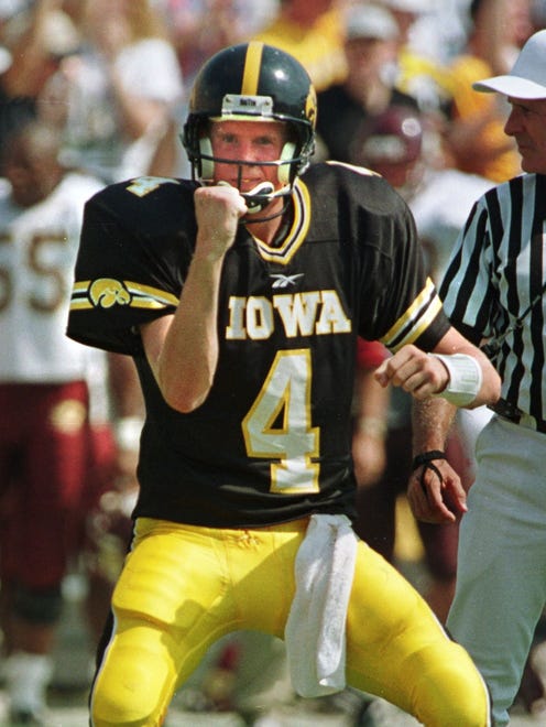 From 1998: Redshirt freshman quarterback Kyle McCann whoops it up after the Hawkeyes scored a touchdown against Central Michigan. McCann completed five of seven passes for 148 yards and a touchdown.