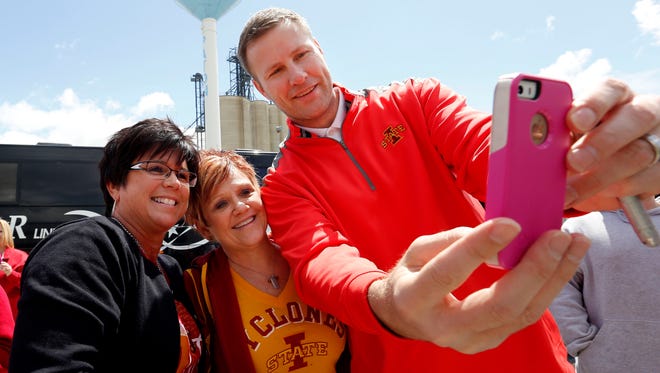CoachFred Hoiberg takes a selfie with ISU fans Sherry Graben, left, and Annie Ostendorf, both of Jefferson, during the first stop of the 2014 Cyclone Tailgate Tour on May 13, 2014, in Paton.