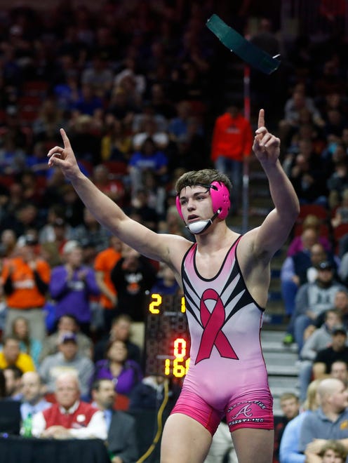 AssumptionÕs Julien Broderson wins the class 2A, 160-pound title match Saturday, Feb. 18, 2017 in the state wrestling finals at Wells Fargo Arena in Des Moines.