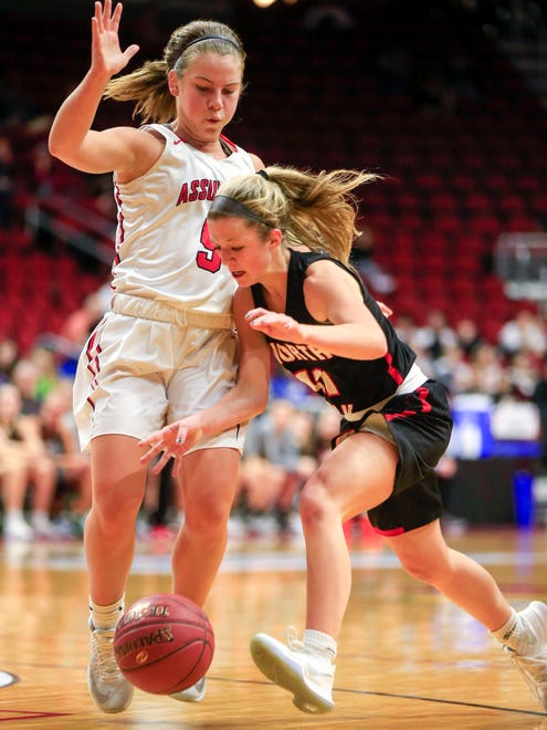 Katie Scott of North Polk drives to the basket during the Class 3A-2 first round game against Davenport Assumption Tuesday, Feb. 27, 2018 at Wells Fargo Arena.