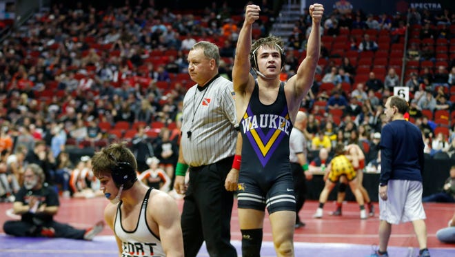 Waukee's Mason Seifried celebrates his win over Fort Dodge's Levi Egli Wednesday, Feb. 14, 2018, in their class 3A match at the 2018 Dual Team Wrestling championships in Des Moines.