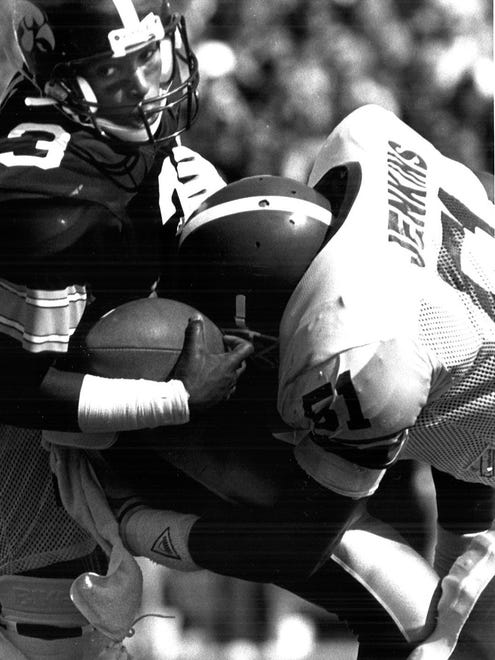 From 1989: Iowa receiver Danan Hughes falls forward for a first down in a 17-14 loss to Michigan State.