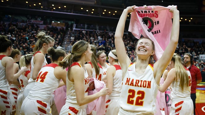 Marion's Sophie Willette (22) celebrates after Marion defeated Grinnell 69-48 during their 4A girls state basketball championship game at Wells Fargo Arena on Friday, March 2, 2018, in Des Moines.