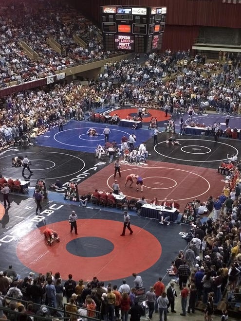 From 2001: The first round of Class 3A state wrestling action in session at Veterans Memorial Auditorium in Des Moines.