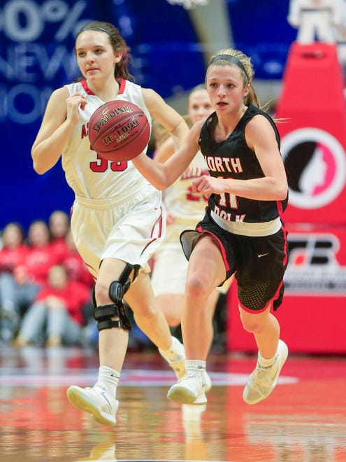 Katie Scott of North Polk drives to the basket during the Class 3A-2 first round game against Davenport Assumption Tuesday, Feb. 27, 2018 at Wells Fargo Arena.
