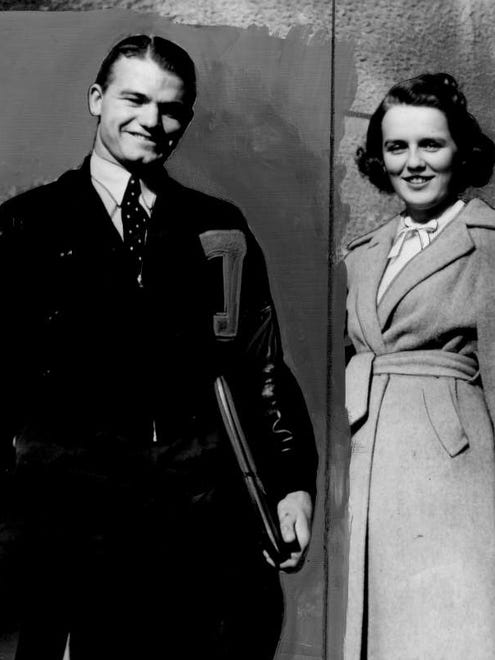 Nile Kinnick poses with his college sweetheart Barbara Miller, a sophomore from Sioux City, days after the Heisman Trophy ceremony, on Dec. 14, 1939.