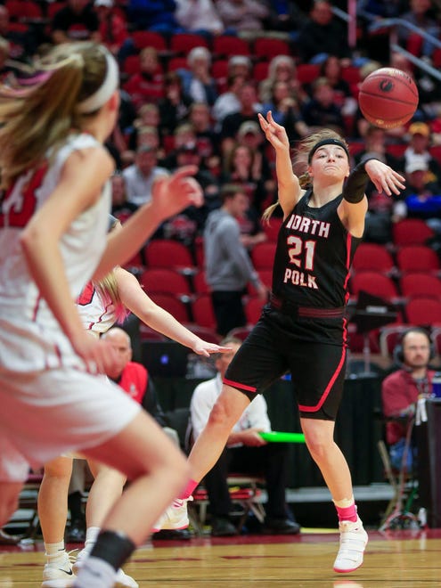 Katie Brown of North Polk makes a pass during the Class 3A-2 first round game against Davenport Assumption Tuesday, Feb. 27, 2018 at Wells Fargo Arena.