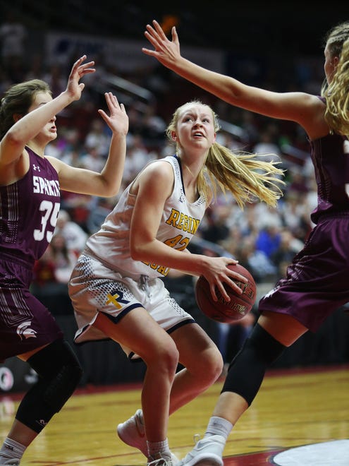 Iowa City Regina's Elly Gahan shoots the ball during the Class 2A Girls' state basketball quarterfinal game between Iowa City Regina and Grundy Center on Tuesday, Feb. 27, 2018, in Wells Fargo Arena.