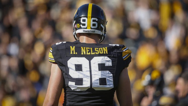 Matt Nelson led a young trio of Iowa defensive ends with 42 tackles this year, and you'll be seeing his No. 96 for two more seasons. But will he move inside to defensive tackle?