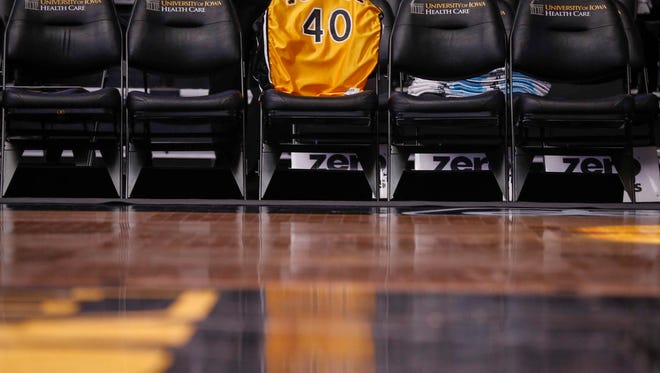 The jersey of former Iowa Hawkeyes basketball player Chris Street drapes over the back of a chair during a ceremony honoring the 25th anniversary of his death at Carver Hawkeye Arena in Iowa City on Saturday, January 20, 2018.