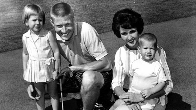 1961: Gary Thompson, former Iowa State and Roland basketball standout, holds daughter Kim, 3, while his wife Janet holds Ricky, 16 months.