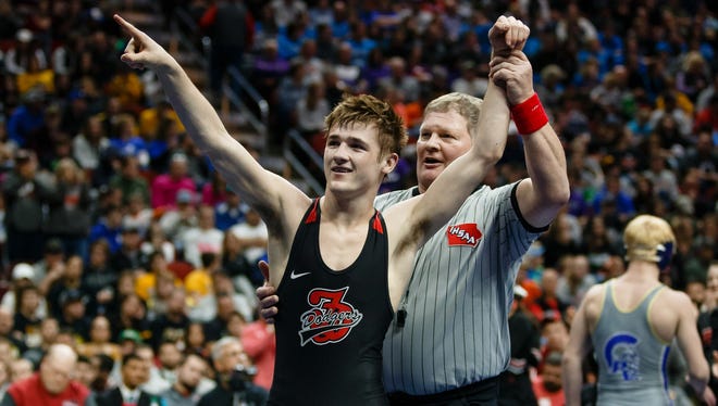 Drew Bennett of Fort Dodge celebrates a 9-4 win over Pleasant Valley's Eli Loyd during their class 3A 132 pound championship match at Wells Fargo Arena on Saturday, Feb. 17, 2018, in Des Moines.