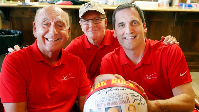 Dick Vitale, Dan Gable, and Steve Prohm sign basketballs during the 6th Annual V Foundation golf outing for Cancer research at Talons of Tuscany in Ankeny Wednesday, June 22, 2016.