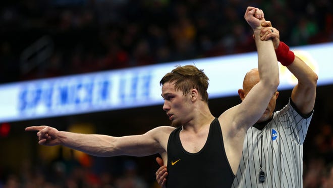 Mar 17, 2018; Cleveland, OH, USA; Iowa Hawkeyes wrester Spencer Lee reacts after defeating Rutgers Scarlet Knights wrestler Nick Suriano during the NCAA Wrestling DI Wrestling Championships at Quicken Loans Arena.