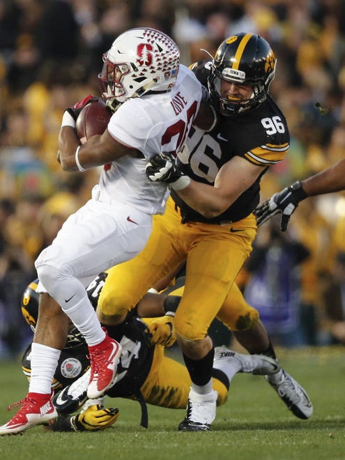 Iowa defensive end Matt Nelson, here hitting Stanford's Bryce Love in the Rose Bowl, got more playing time toward the end of the 2015 season when Nate Meier was banged up.
