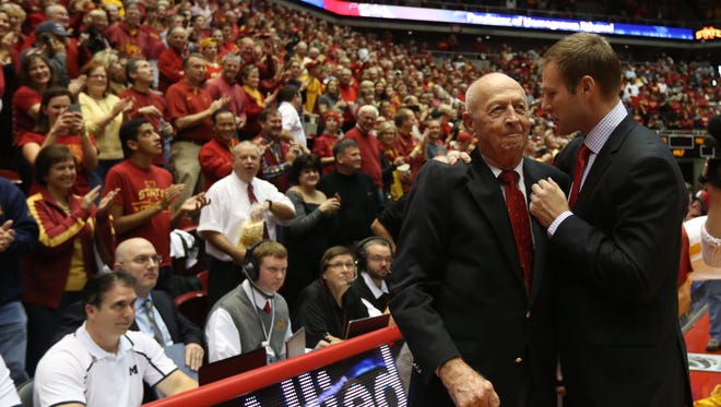 Fred Hoiberg talks with Johnny Orr before the Iowa State-Michigan game on Nov. 17, 2013, at Hilton Coliseum in Ames.