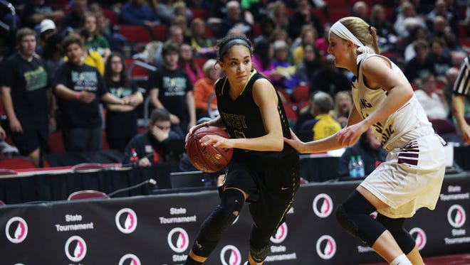 Iowa City West's Cailyn Morgan drives to the hoop during the Class 5A Girls' state basketball quarterfinal game between Dowling Catholic and Iowa City West on Monday, Feb. 26, 2018, in Wells Fargo Arena.