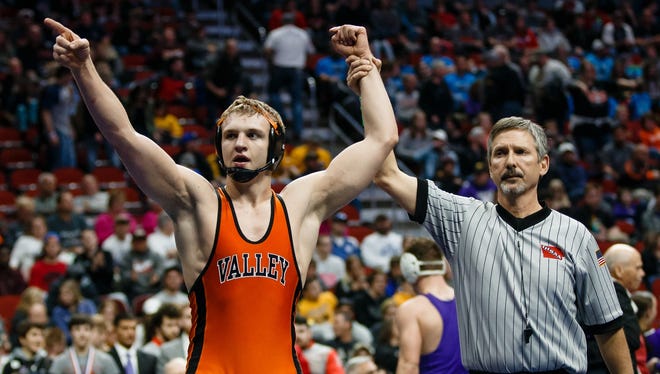 Joel Shapiro of Valley celebrates an 8-2 victory over Waukee's Brandon Tessau during their class 3A 182 pound championship match at Wells Fargo Arena on Saturday, Feb. 17, 2018, in Des Moines.