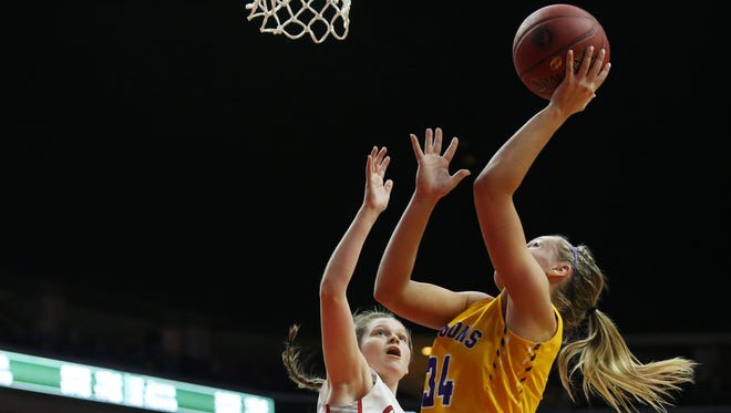 Johnston's Jennah Johnson shoots the ball during the Class 5A Girls' state basketball semifinal game between Johnston and Iowa City High on Thursday, March 1, 2018, in Wells Fargo Arena.