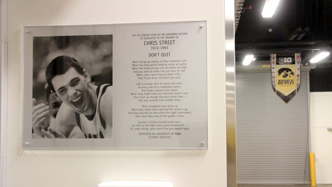 From 2013: A plaque dedicated to former Hawkeye star Chris Street is on display outside the men's basketball team's locker room at Carver-Hawkeye Arena in Iowa City.