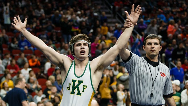 Ben Sarasin of Cedar Rapids, Kennedy celebrates a 9-5 victory over Anthony Zach of Waukee during their class 3A 170 pound championship match at Wells Fargo Arena on Saturday, Feb. 17, 2018, in Des Moines.