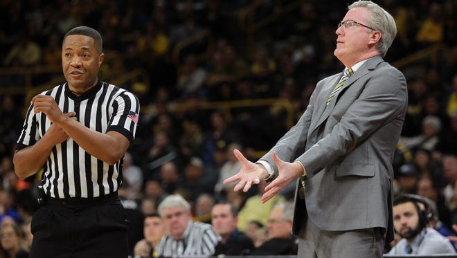 Iowa head coach Fran McCaffery looks for a call during the Hawkeyes' game against Michigan at Carver-Hawkeye Arena on Tuesday, Jan. 2, 2018.