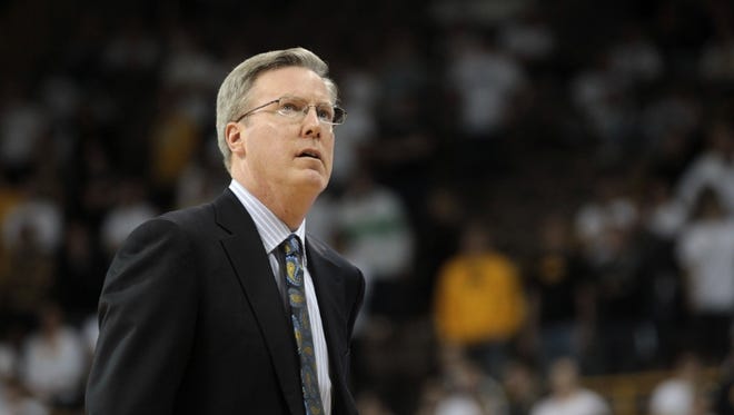 Iowa head coach Fran McCaffery glances at the scoreboard during the Hawkeyes' game against Michigan State at Carver-Hawkeye Arena on Thursday, Jan. 10, 2012.