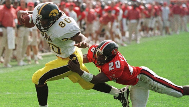 From 1998: Iowa tight end Zeron Flemister hauls in an 11-yard touchdown pass despite the efforts of Indiana's Greg Yeldell.