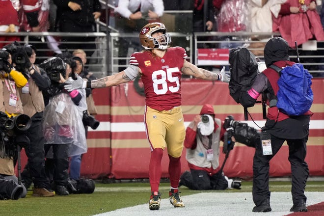 SANTA CLARA, CALIFORNIA - JANUARY 20: George Kittle #85 of the San Francisco 49ers celebrates after scoring a 32-yard touchdown during the second quarter against the Green Bay Packers in the NFC Divisional Playoffs. (Photo by Thearon W. Henderson/Getty Images)