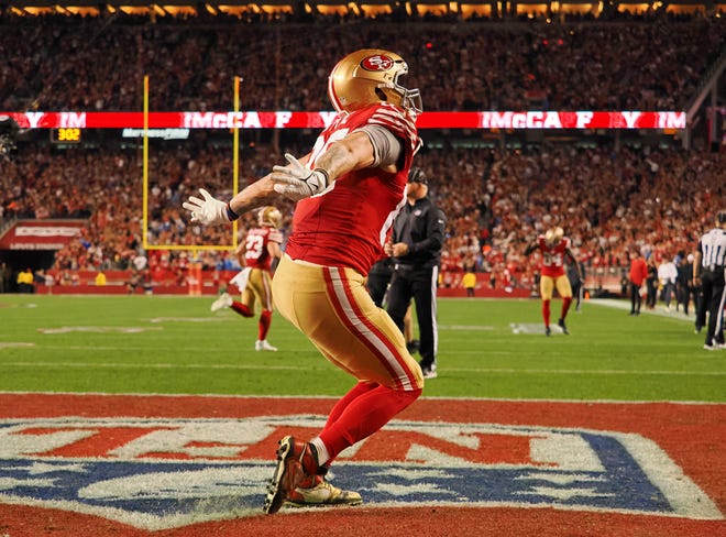Jan 28, 2024; Santa Clara, California, USA; San Francisco 49ers tight end George Kittle (85) celebrates after a touchdown against the Detroit Lions during the second half of the NFC Championship football game at Levi's Stadium. Mandatory Credit: Kelley L Cox-USA TODAY Sports